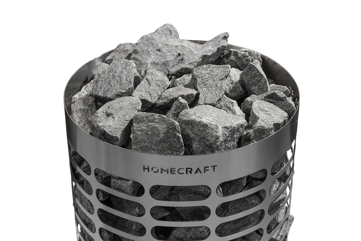 Cylindrical Homecraft Apex heater with stones above the rim